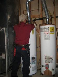 Mesquite TX plumber repairs a water heater